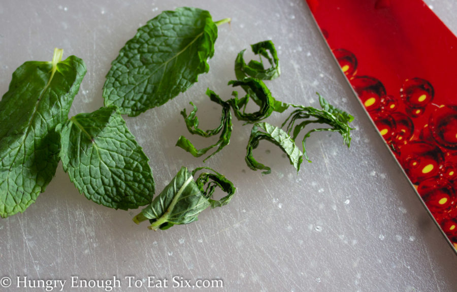 Mint leaves cut chiffonade style (into ribbons.) 