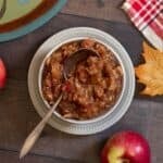 White bowl of homemade applesauce.