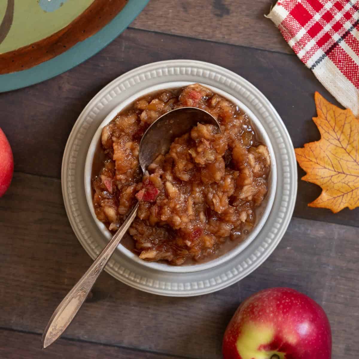 White bowl of homemade applesauce.