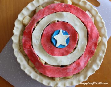 Unbaked apple pie with red, white and blue concentric circles