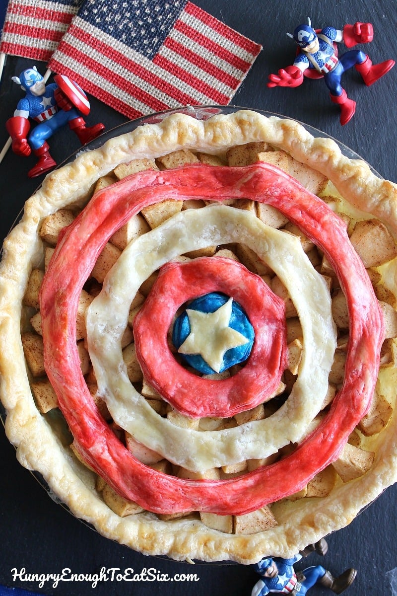 White star in middle of red and white rings on a pie