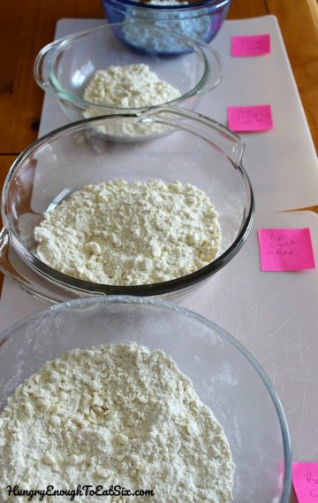 Four bowls of flour and butter mixtures
