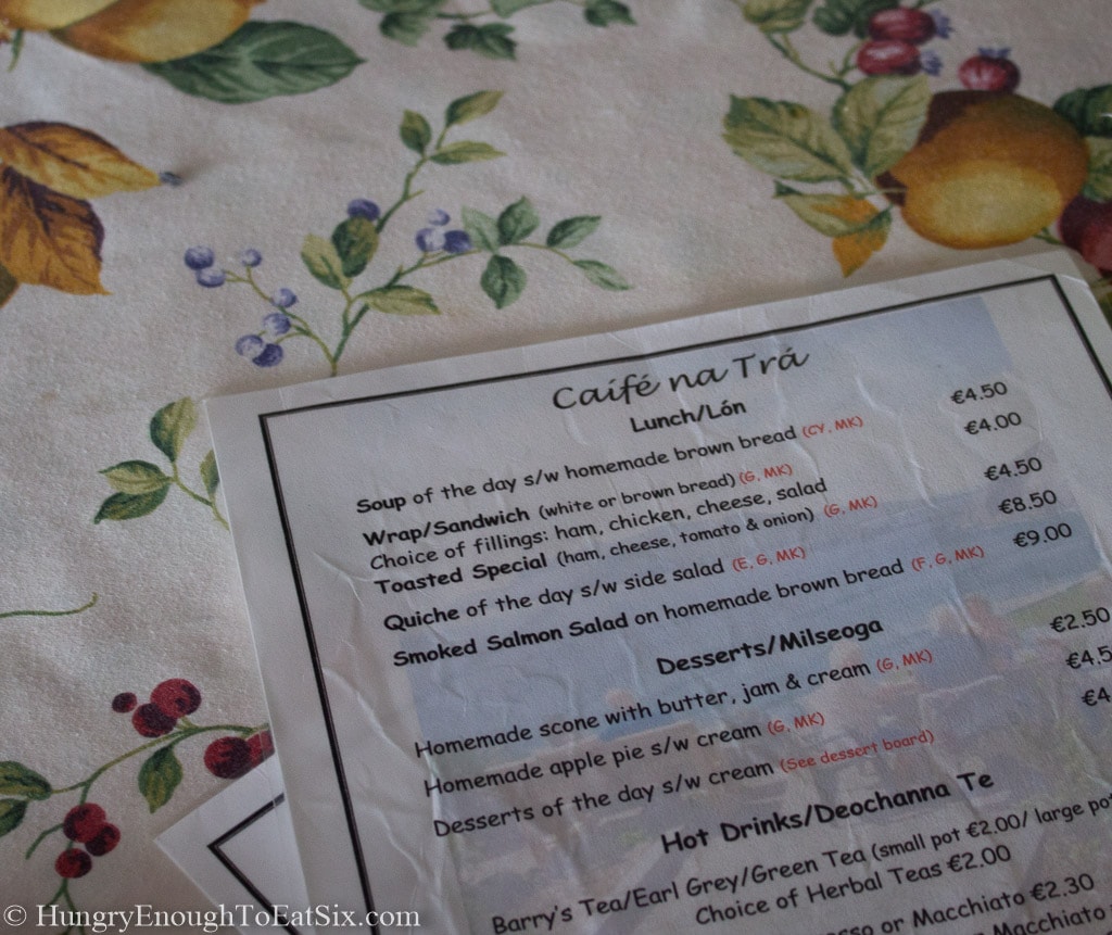 Cafe menu on a floral tablecloth