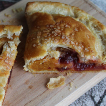 Hand pie with pumpkin and cranberry filling