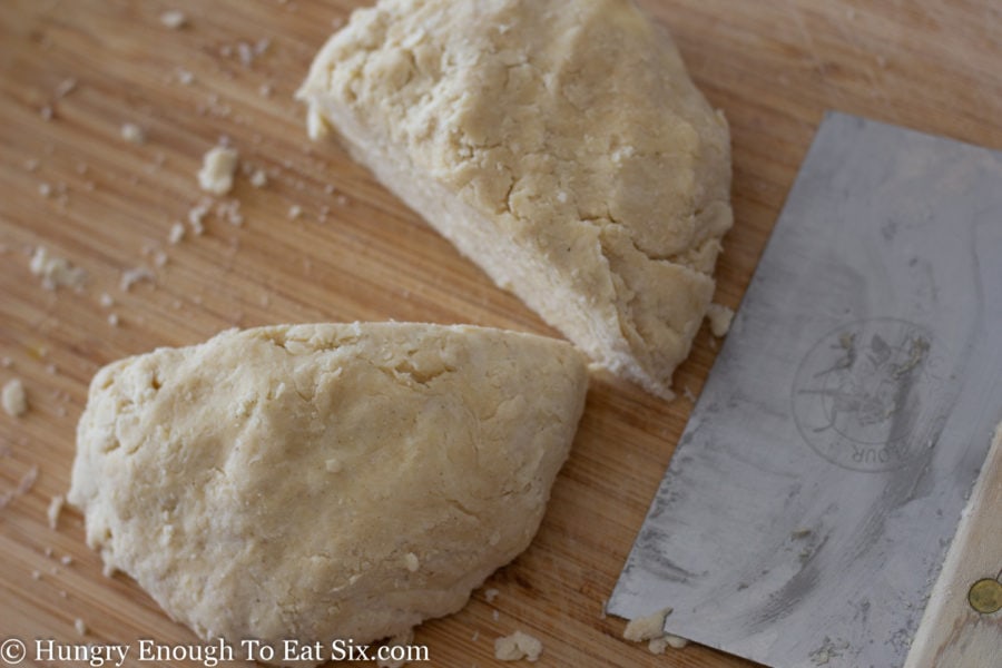 Pie crust dough cut into two halves.
