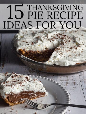 Chocolate pie with slice out, all topped with whipped cream.