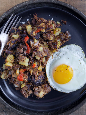 Fork and plate with beef hash