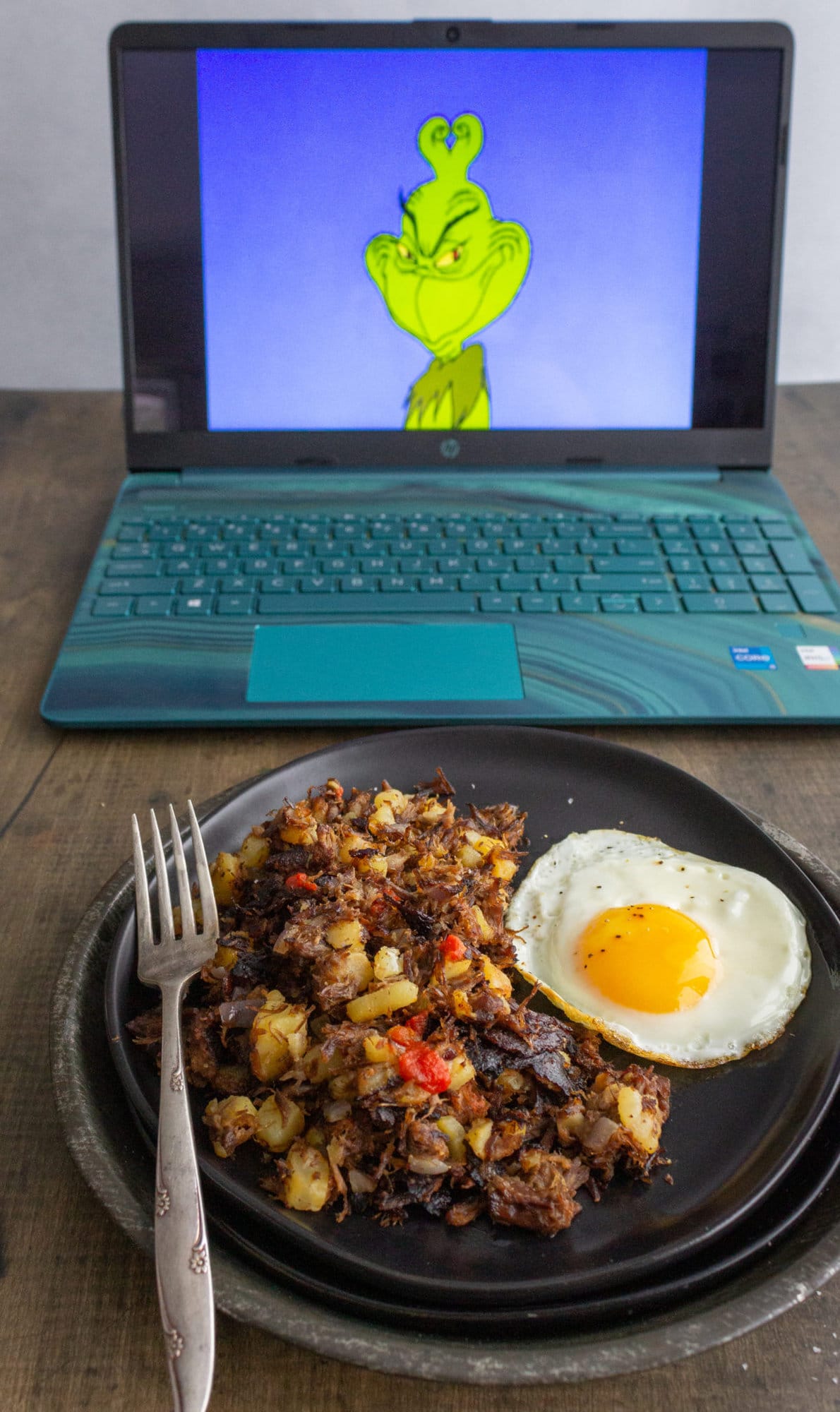 plate of hash near laptop