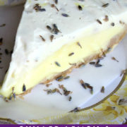 Lemon pie with white whipped cream top and a sprinkle of lavender buds.