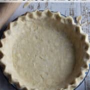 Unbaked pie crust with crimped edge.