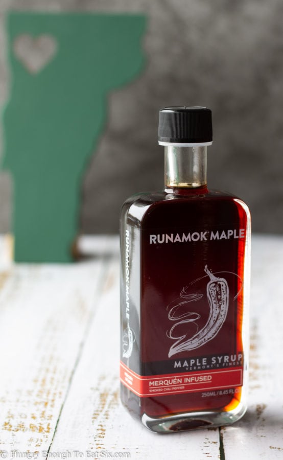 Runamok Maple Syrup in glass bottle on a white background.