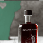 Maple syrup, Runamok brand on white surface.