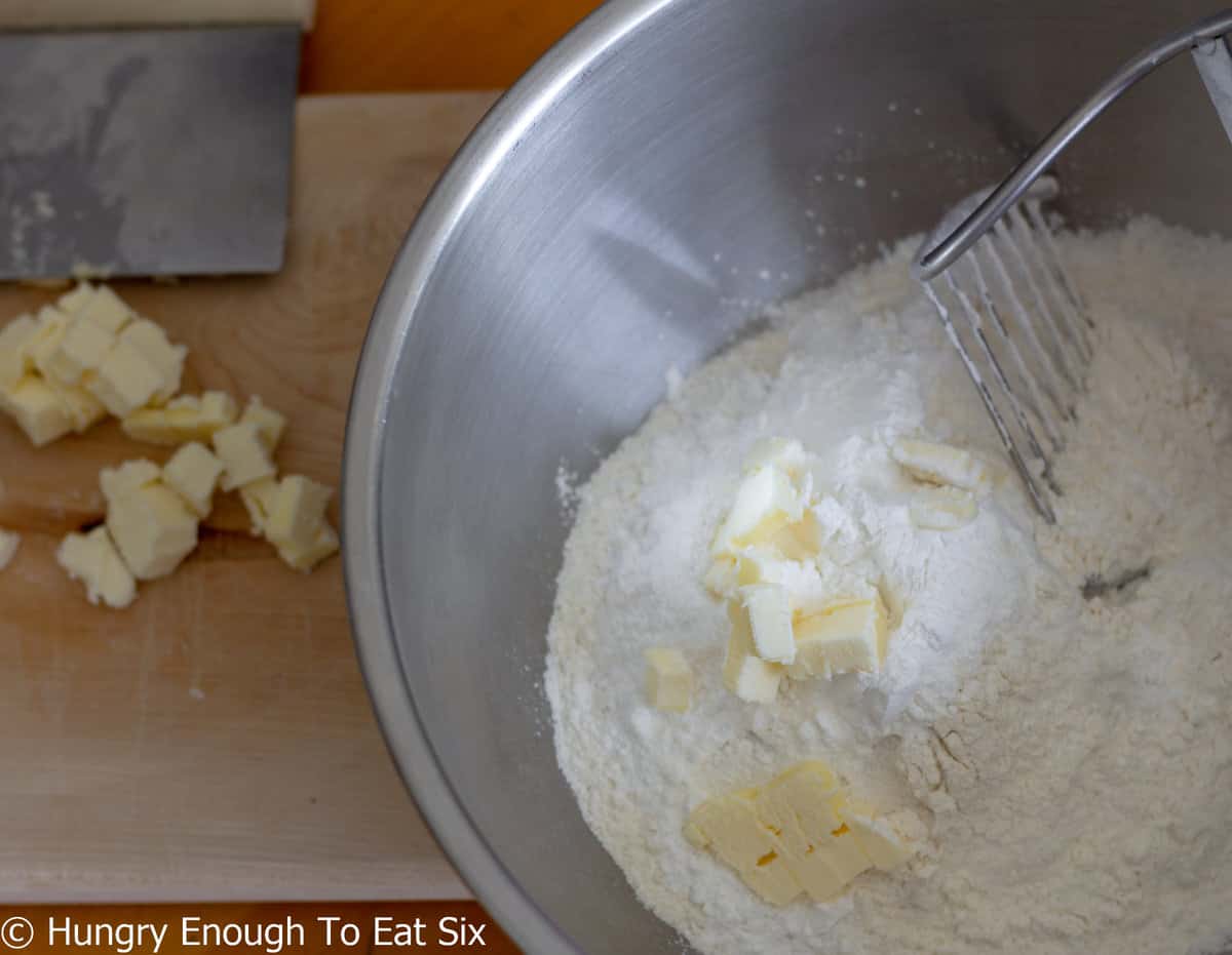 Butter cut into flour mixture.