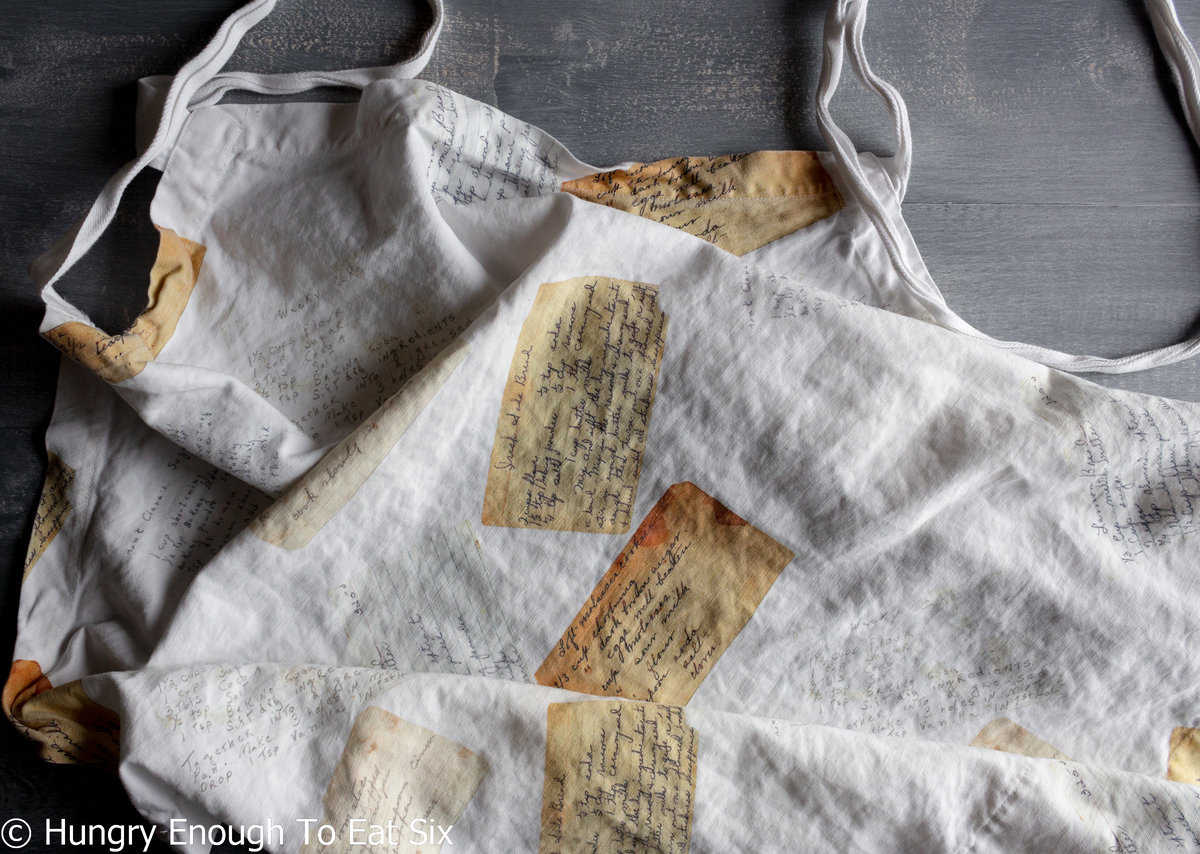 Apron printed with old recipe card images.