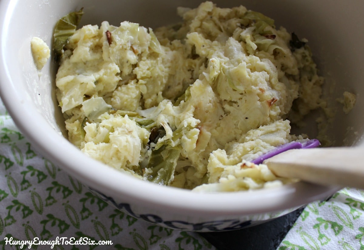 Bowl of mashed potatoes with cabbage strips
