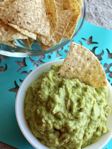 Bowls of guacamole and chips