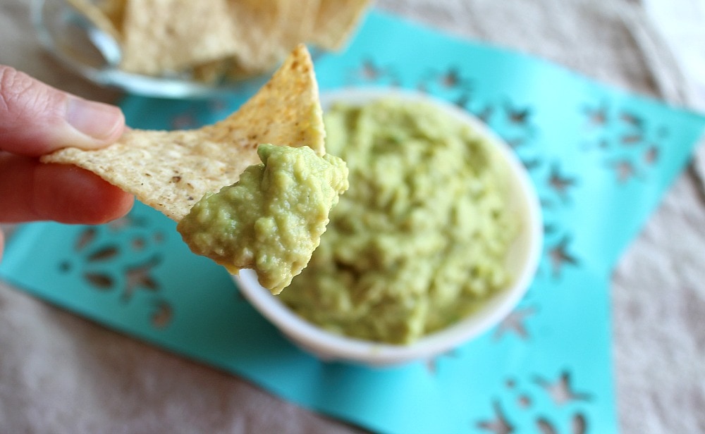 Chip with green guacamole