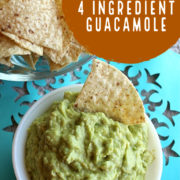 Bright green guacamole with a chip