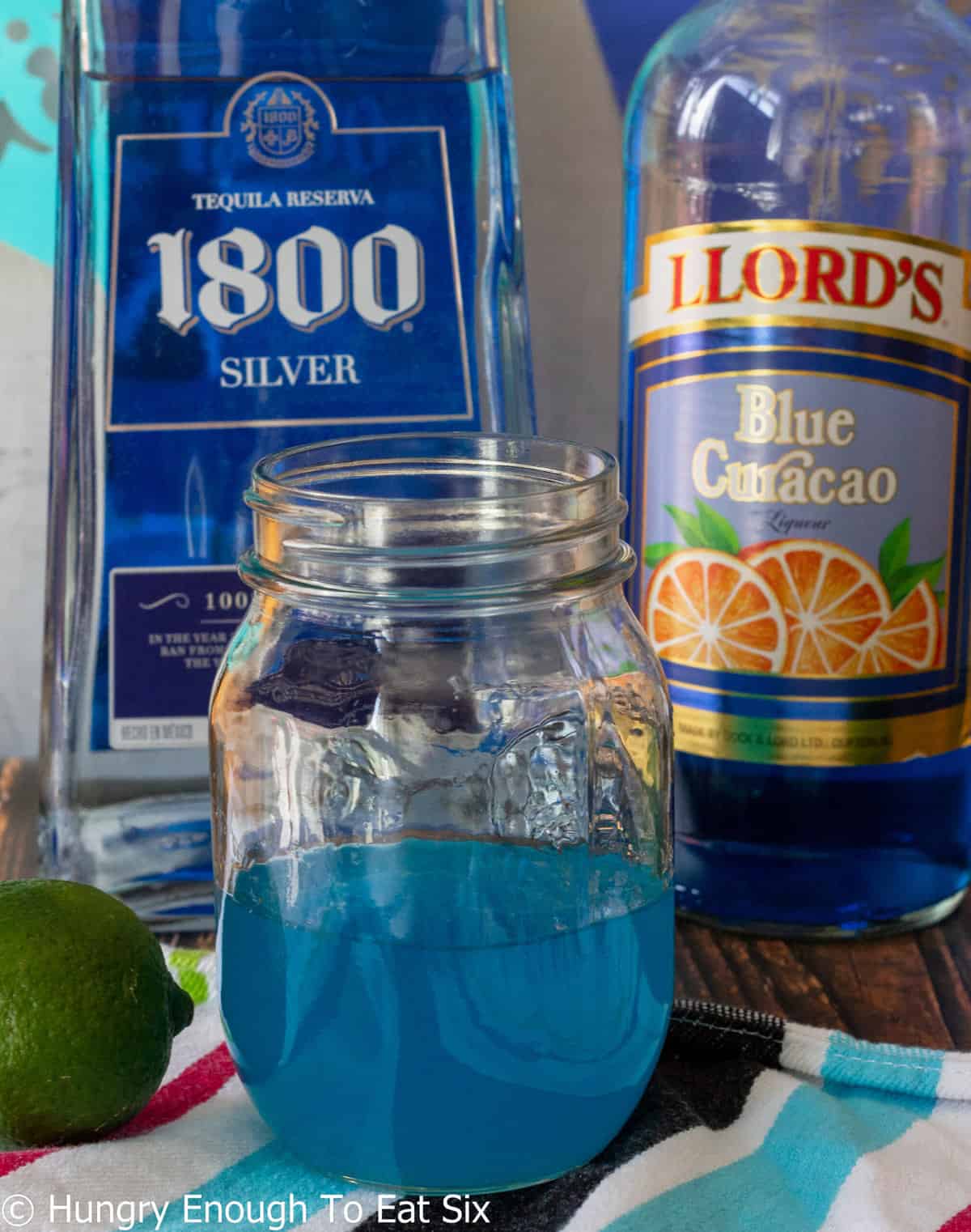 Blue liqueur in a mason jar.