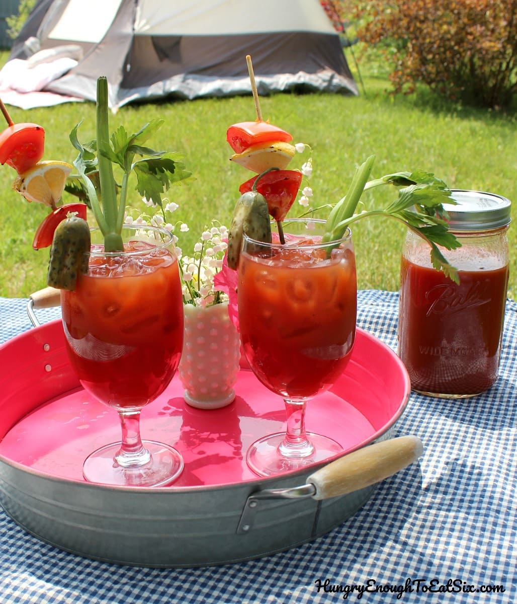 Tray with two bloody mary drinks
