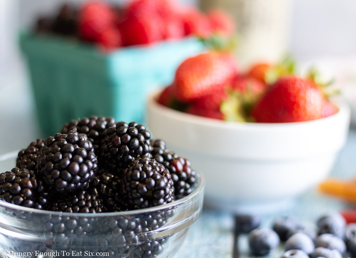 Small glass bowl of blackberries.