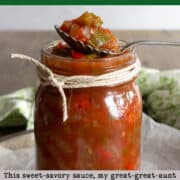Glass jar with pepper onion sauce.