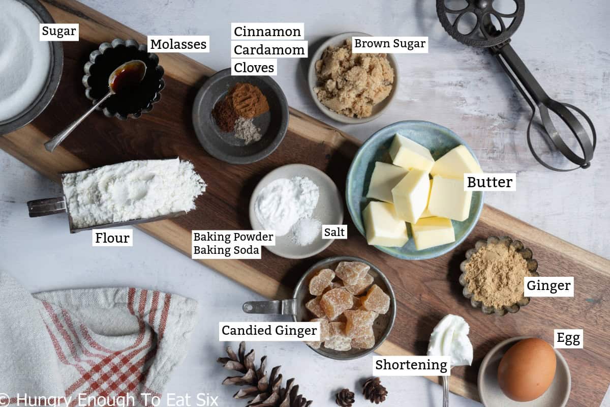 Ingredients: butter, shortening, candied ginger, flour, sugar, brown sugar, egg, spices, baking soda and powder; all for ginger cookies recipe.