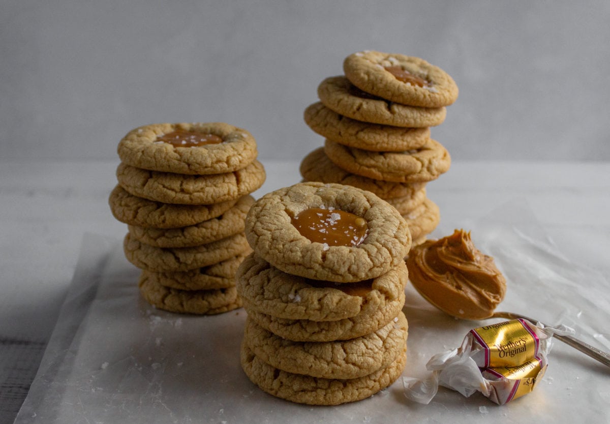 peanut butter cookies with caramel in stacks