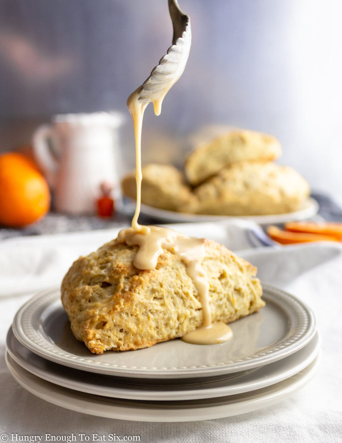 Glaze spooned over a scone