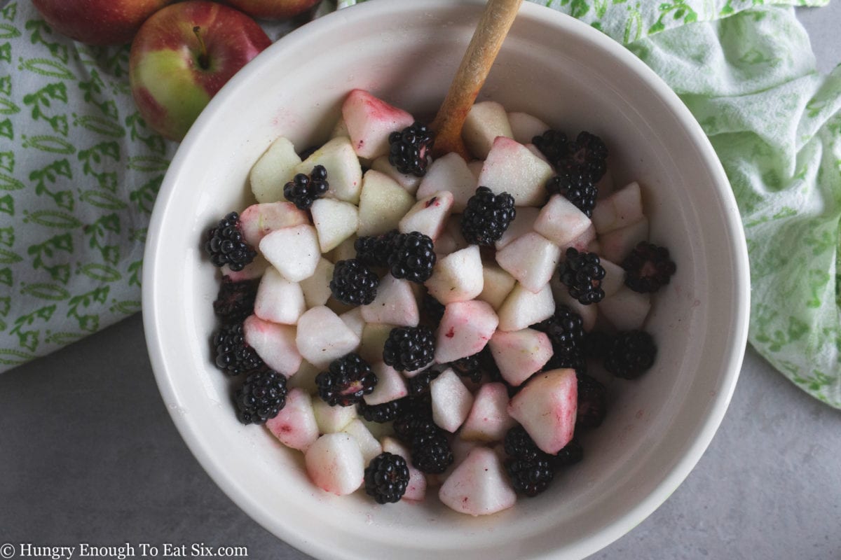 Bowl of chopped apples and berries