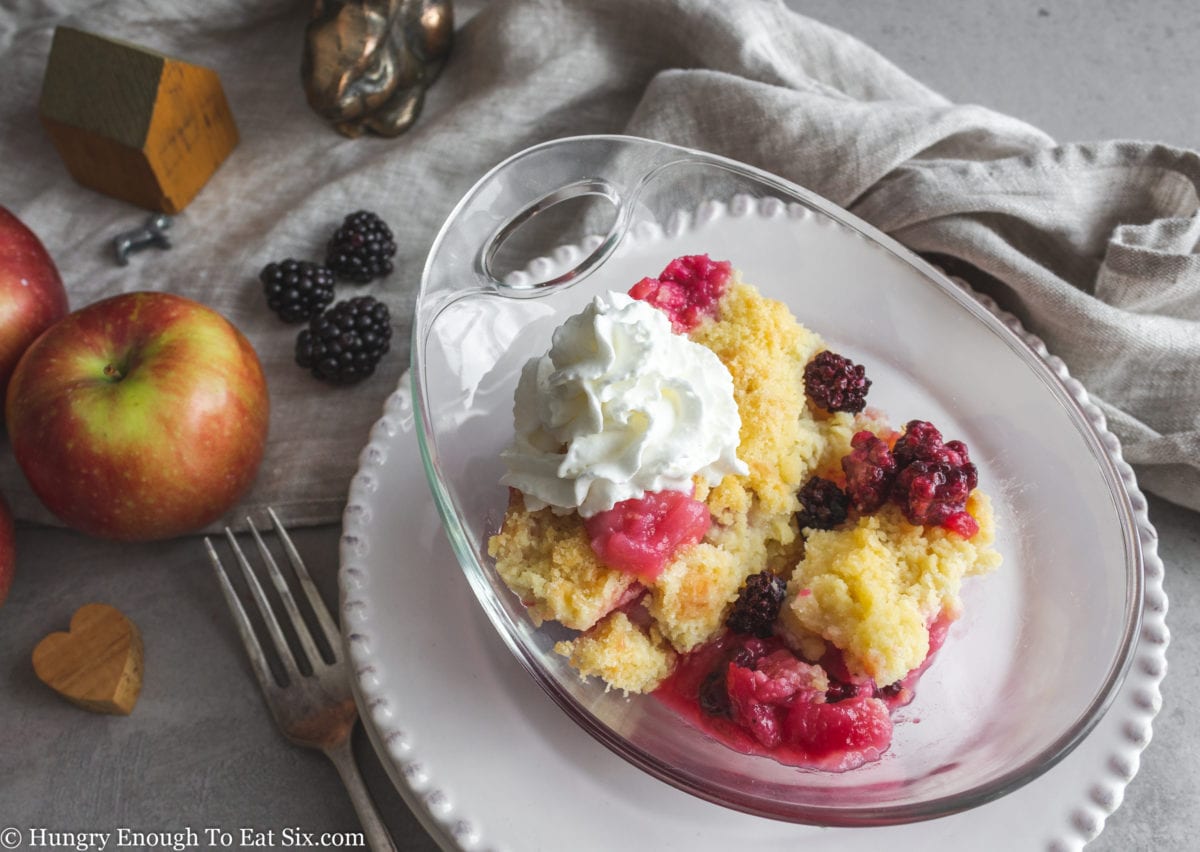 Clear dish of apple and berry crumble