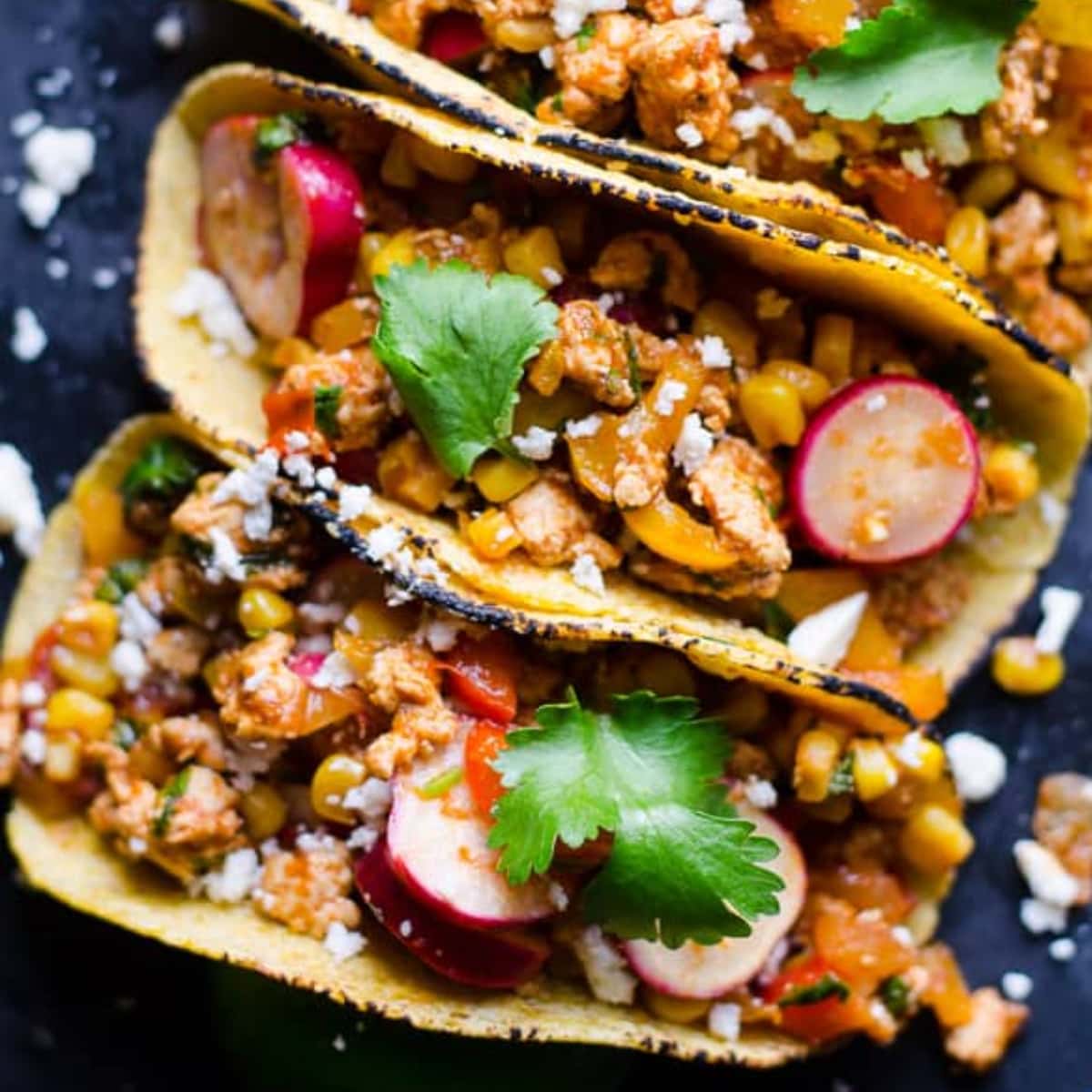 Tacos with chicken and radishes