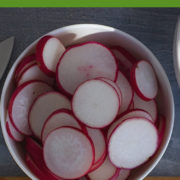 Radishes sliced in a white bowl