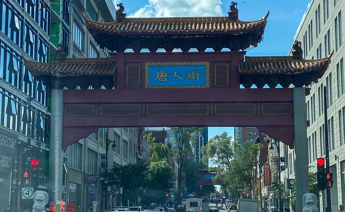 Chinese-style arch over a street entrance in Montreal.