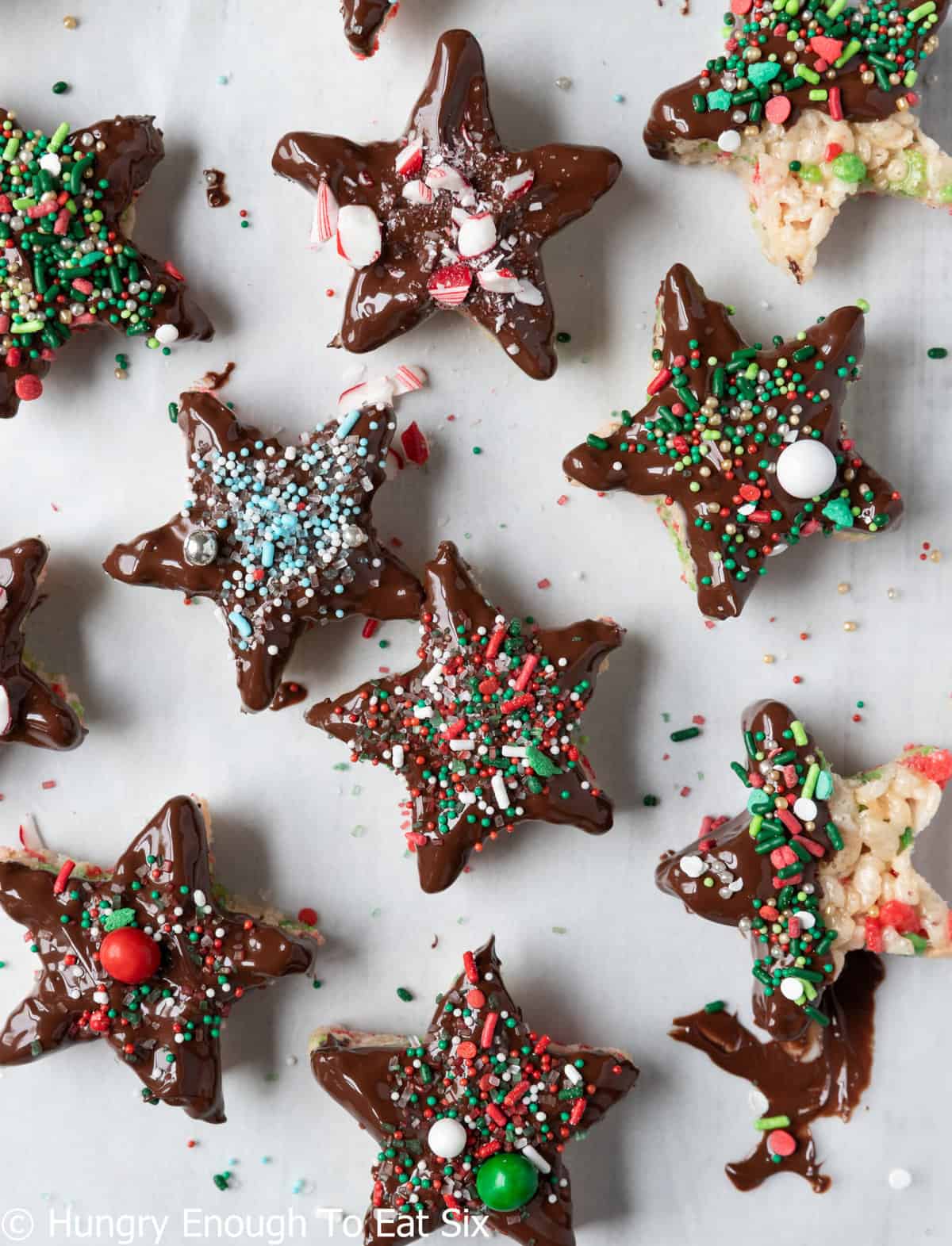 Marshmallow star-shaped treats with melted chocolate.