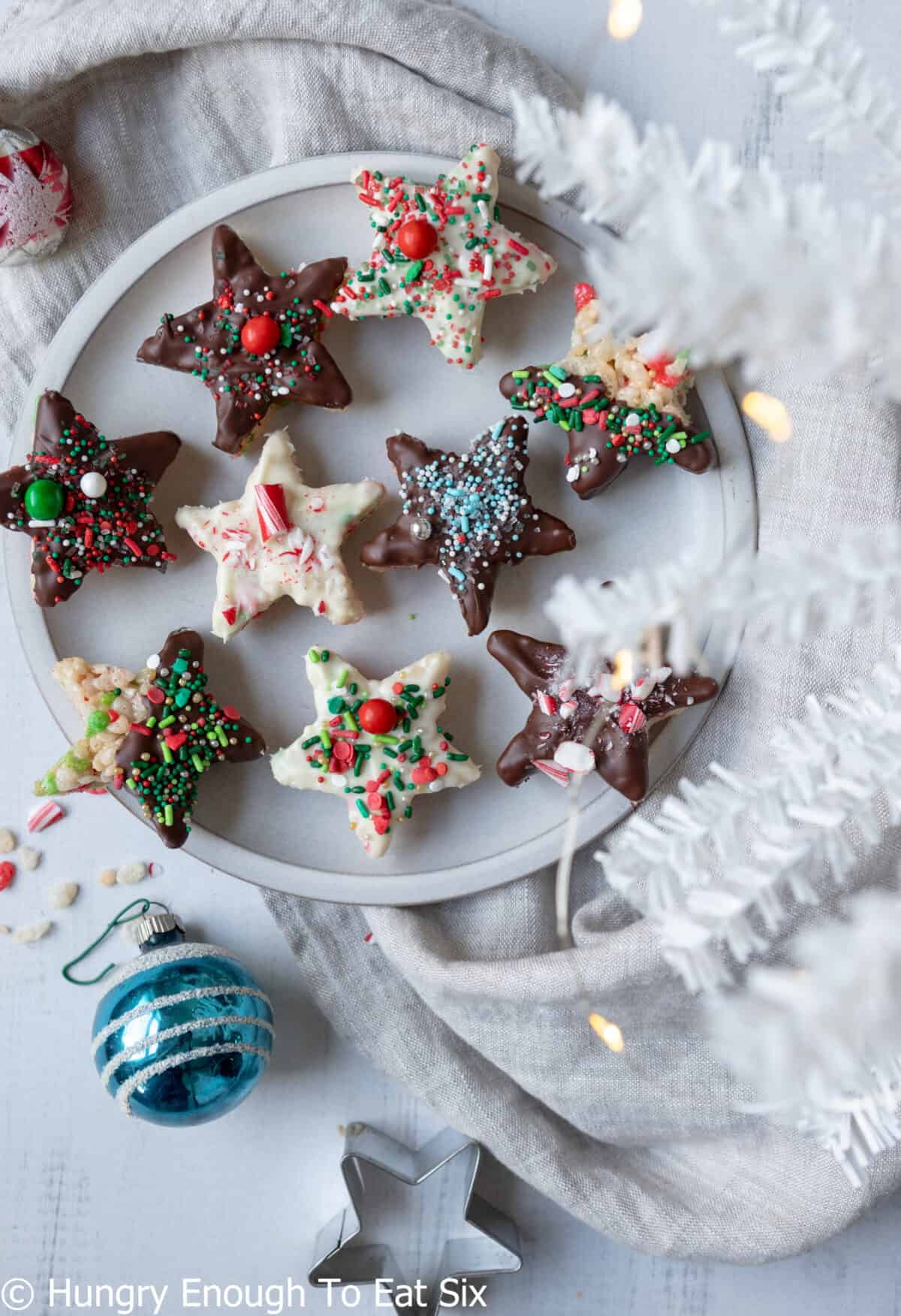 Chocolate dipped marshmallow treats with sprinkles.