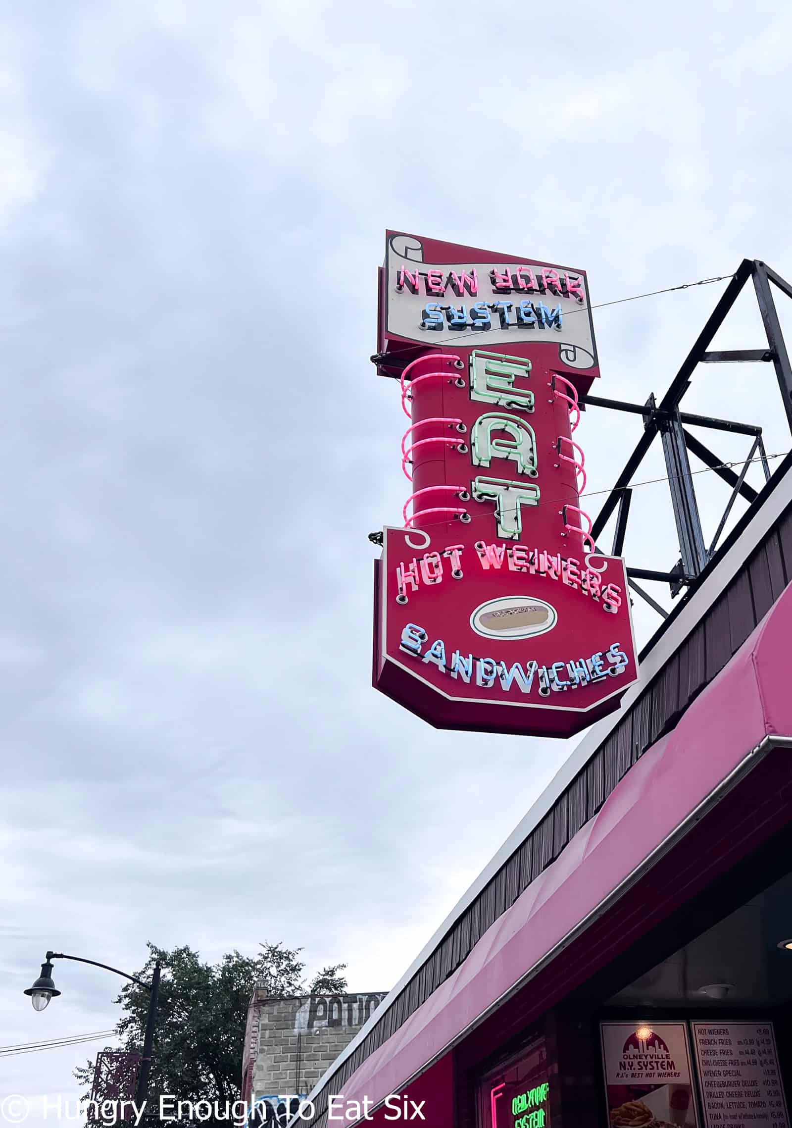 Red and white sign for Olneyville NY System in Providence, RI.