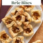 Brie and apple baked pastry bites on a platter.