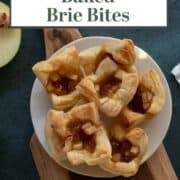 Plate holding several baked brie bites made with fig and apple.