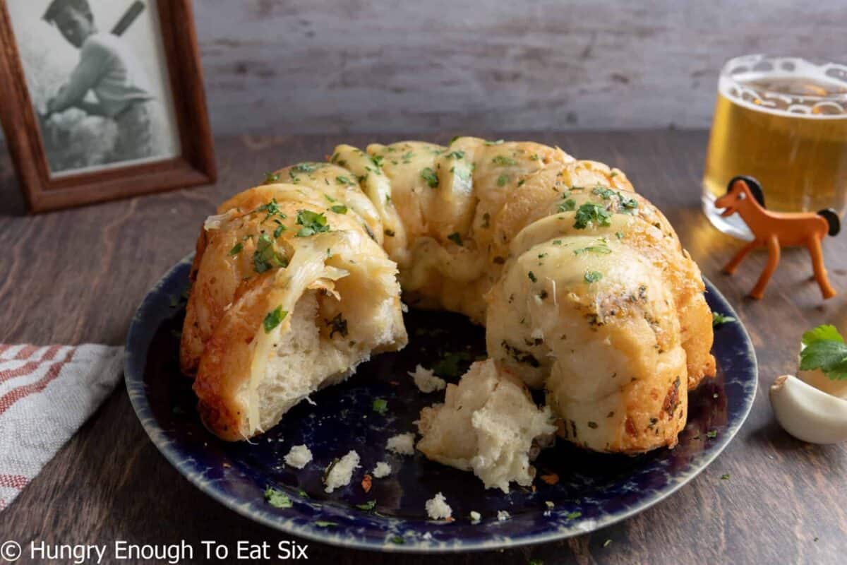Ring of pull-apart bread with cheese and herbs. 