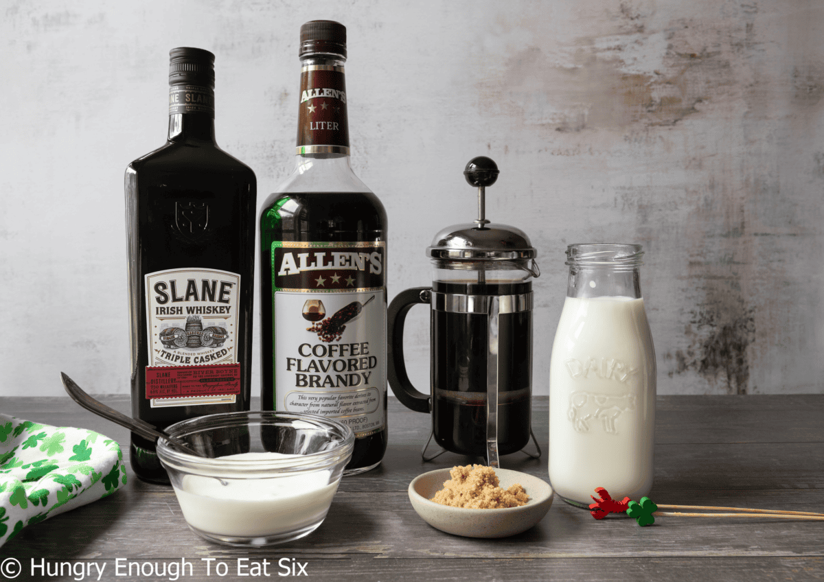 Coffee brandy, Irish whiskey, cream, milk, brown sugar, coffee, for an Irish Coffee.