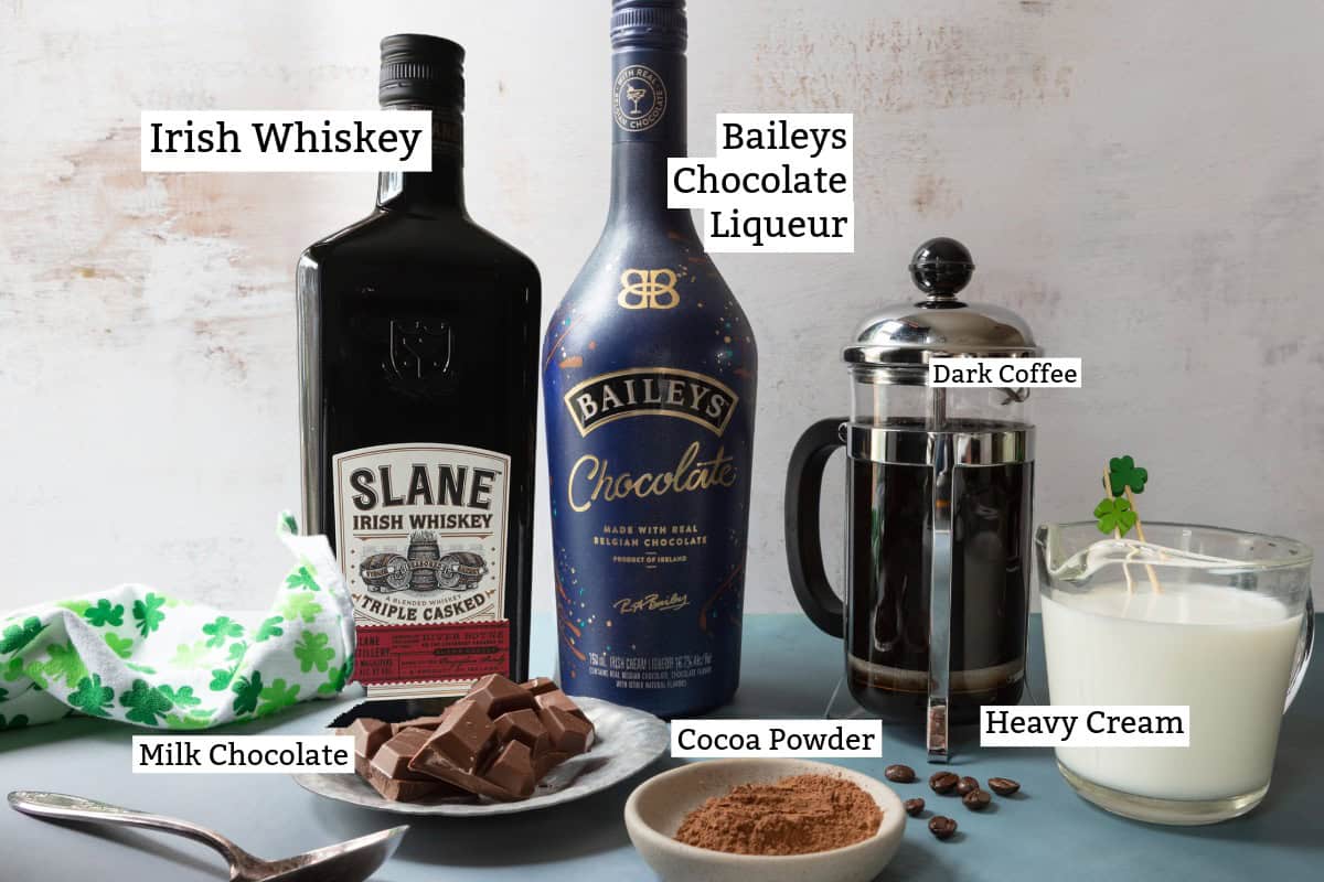 Chocolate Irish Coffee ingredients: Whiskey, chocolate Baileys, milk chocolate, cocoa powder, cream and coffee; for a chocolate Irish coffee.