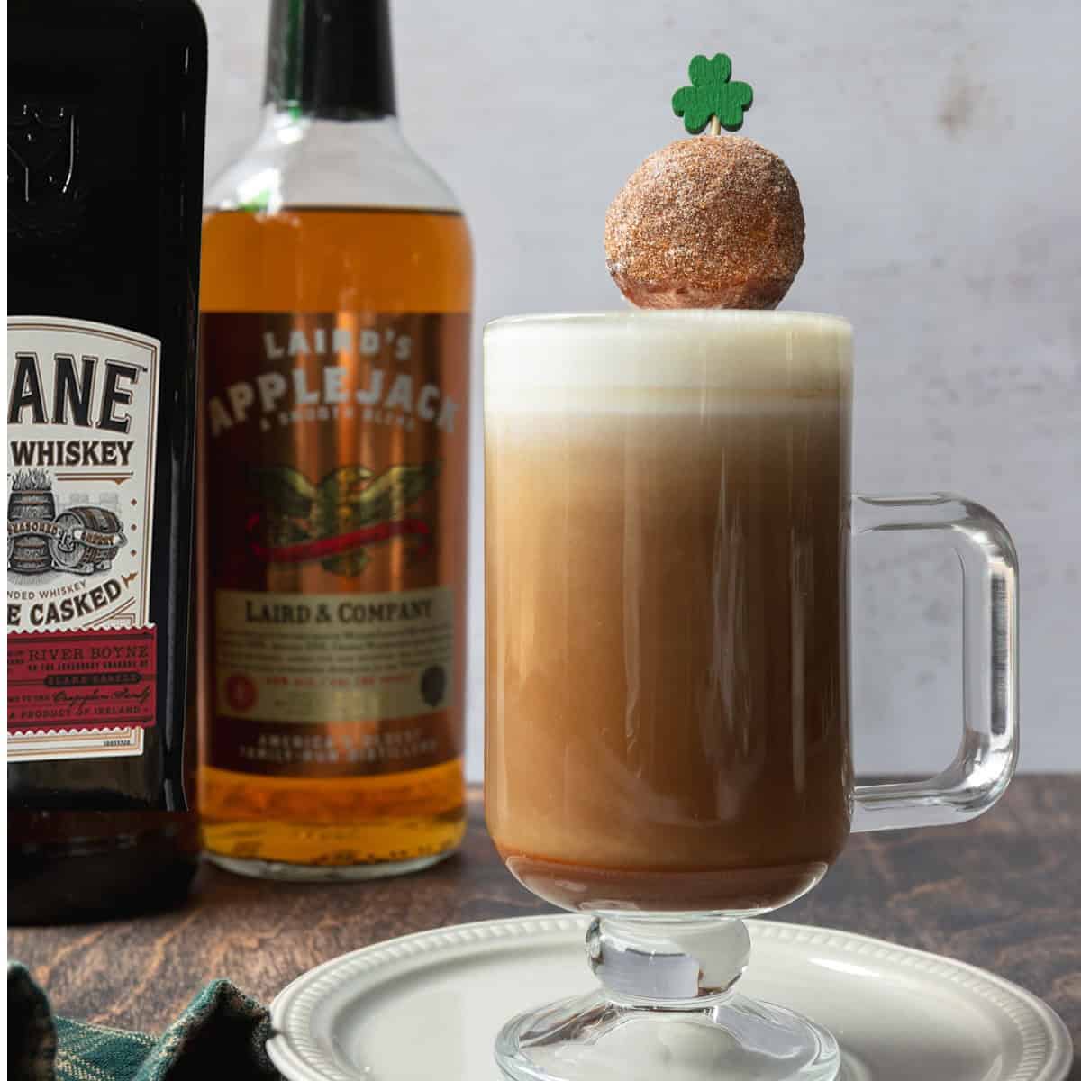Apple cider donut irish coffee in a glass.