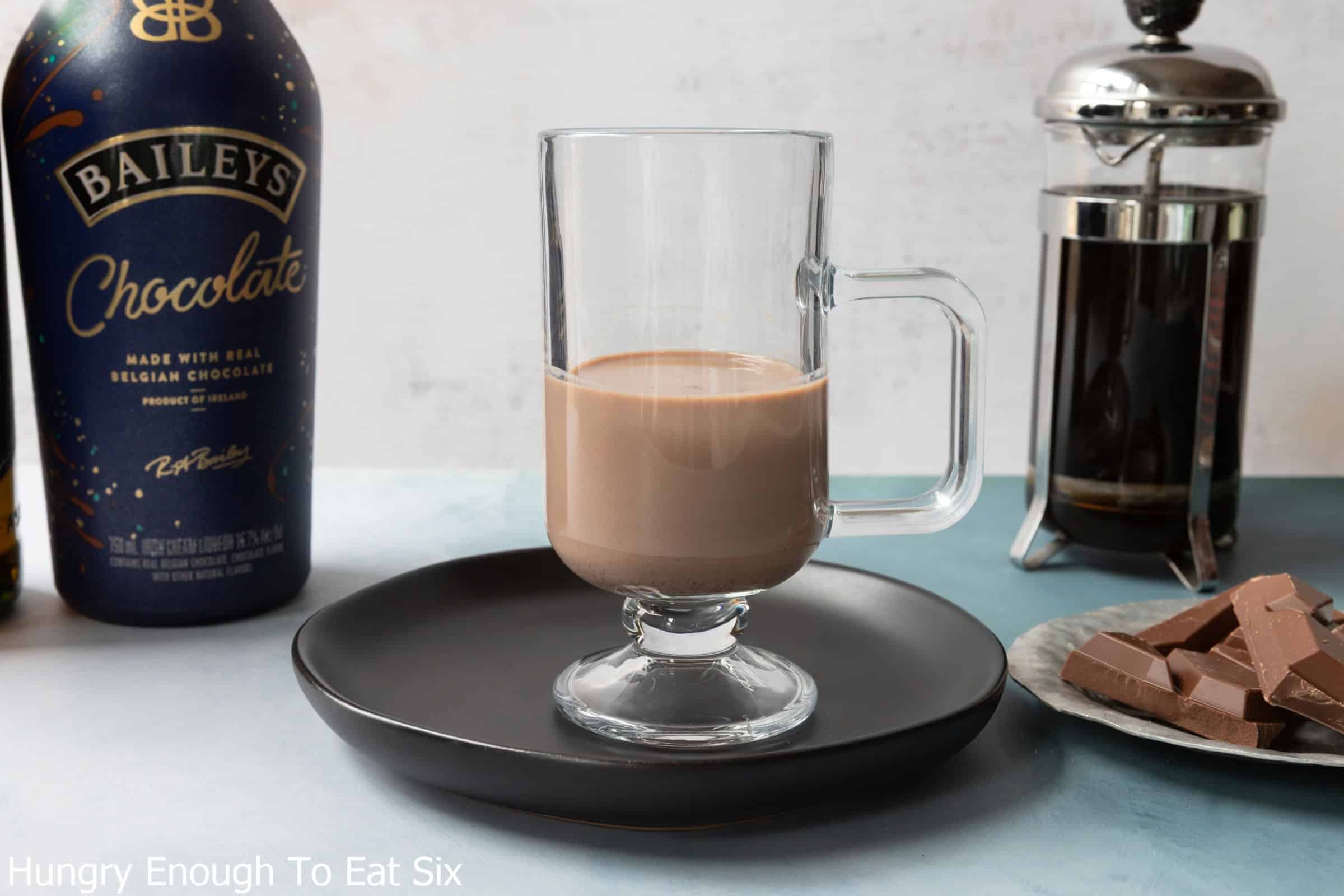 Mug with chocolate liqueur to make a chocolate Irish coffee.