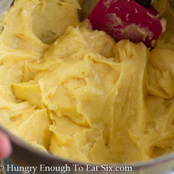 Lemon flavored choux pastry dough in a bowl.
