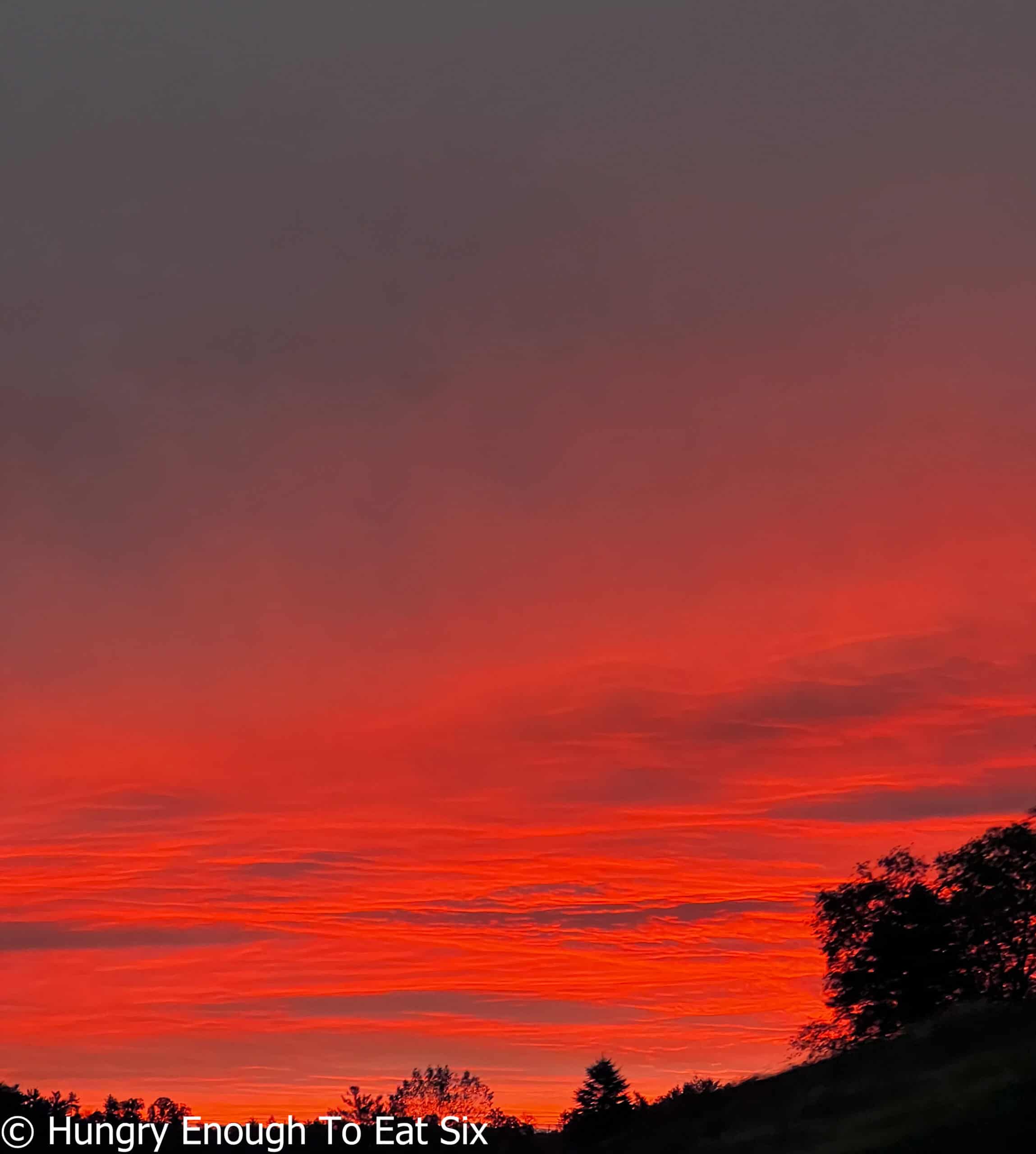 Red, cloudy sky in morning.