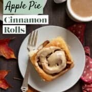 Frosted sweet roll on a plate.