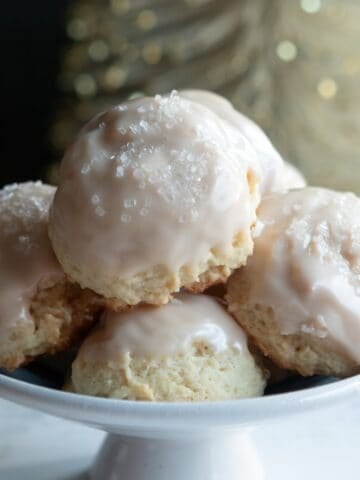 Round, iced Cozy-Ups Soft Vanilla Sugar Cookies.