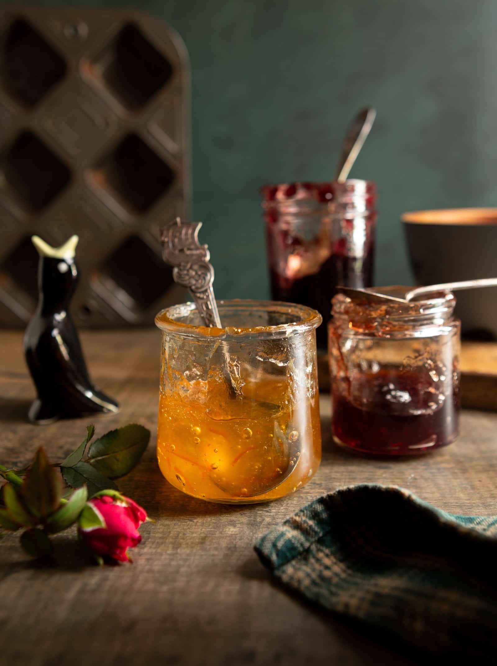 Three jars of leftover jam to be used in buttermilk scones recipe.