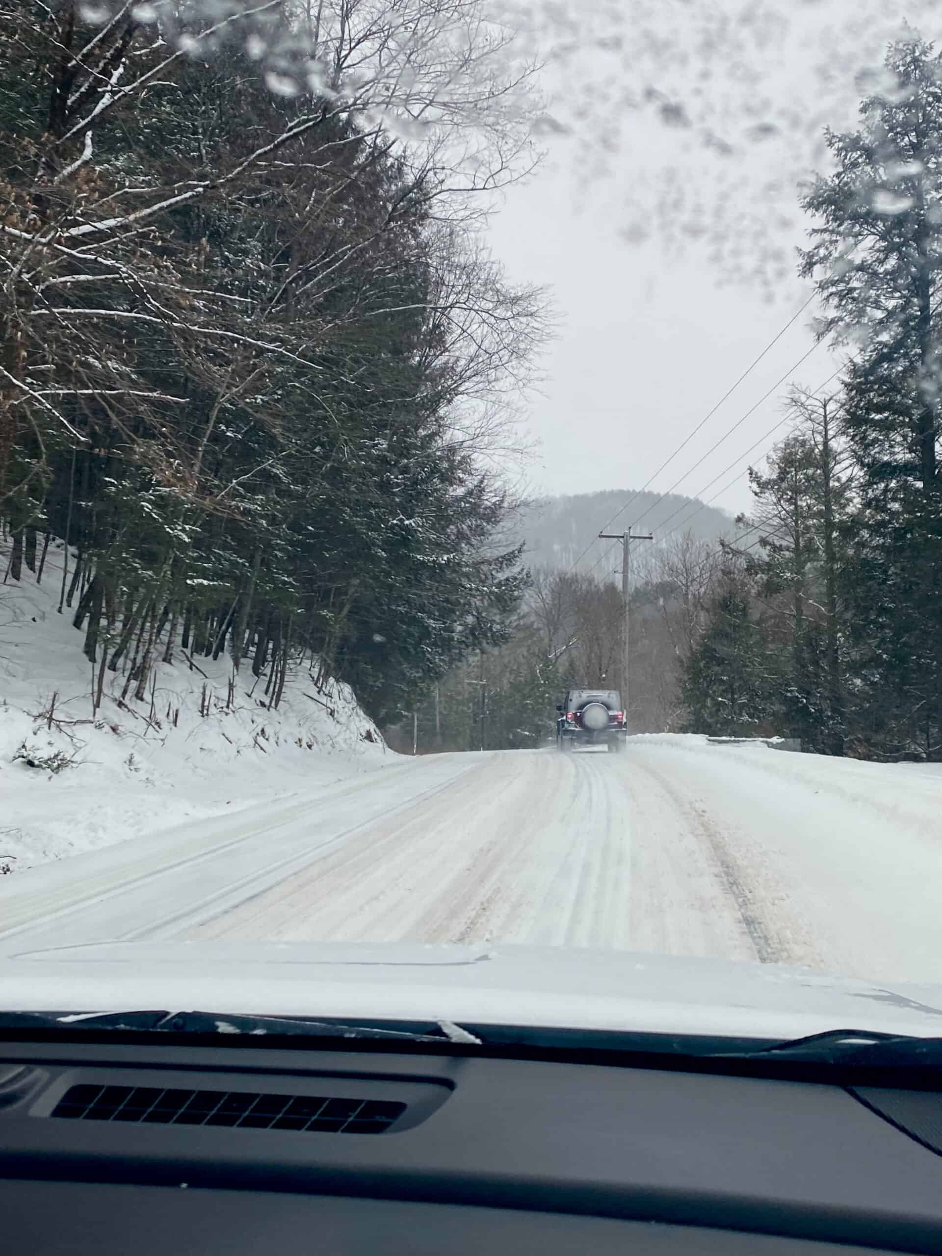 Snow covered road in Vermont in wintertime.